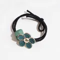Floral elastic hair tie with turquoise corduroy petals and gold trim on black band - Dark Green