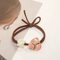 Elegant brown elastic hair tie featuring white faux pearls and pink enamel pendant - Pink Triangle Stone