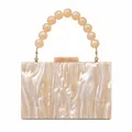 Elegant pearlescent acrylic evening clutch bag with round pearl beaded handle - Apricot