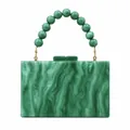 Detail of green marble acrylic evening bag with beaded handle and gold hardware - Green Gradient