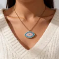 Close-up of golden Evil Eye necklace with pink and blue enamel and zircon inlay - Blue Pink White Contrast (ADD-202G-1)