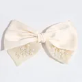 Elegant cream satin bow hair clip with decorative pearls and shimmering mesh detail - Creamy White Mesh Pearl