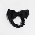 Elegant black bow hair tie featuring ribbed fabric and glossy satin finish - Black Sequin Scrunchie