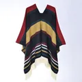 Detail of bohemian knit poncho featuring colorful geometric patterns and ivory tassels - 130x150cm / Colorful Stripe Pullover Tassel Black Red