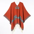 Caramel knitted poncho with blue wolf pattern and thick cream fringes - 130x150cm / Wolf Pattern Pullover Tassel (Orange)