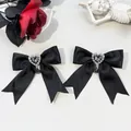 Detail of gothic black satin bow hair clips with heart rhinestone and black water drop gemstone - Black Heart Rhinestone Teardrop Gem Style (9#)