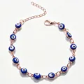Bracciale a catena oro rosa con perline malocchio blu e catenella di estensione - Oro rosa