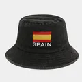 Close-up of Spain flag embroidery and metal eyelets on washed cotton bucket hat - One Size / Spain Flag Black
