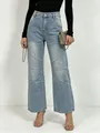 Détail de jean taille haute bleu clair avec coutures en diagonale et effet délavé vintage - S / Bleu clair