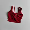 Red high-impact sports bra with multi-strap design and back twist detail - Ancorra Red