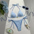 Light blue two-piece bikini set with white floral embroidery and gold flower detail - S / Light Blue Daisy Embroidery