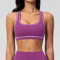 Purple yoga sports bra featuring white contrast stitching and racerback design - S / Tops / Mulberry Purple