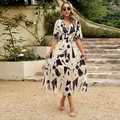 Elegant beige floral print V-neck maxi dress with high waist and short puff sleeves - S / Apricot (Geometric)