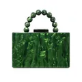 Macro view of dark green marble acrylic evening clutch with beaded wrist handle - Green