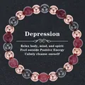 Macro detail of natural stone beaded bracelet with rose gold and metallic beads - Grey Gold Red Tri-color Healing Beads (Depression-5)