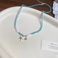 Collana di perline blu a tema oceanico con ciondoli a stella marina e conchiglia - Collana 26# - Blu