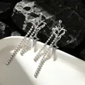 Silver long tassel earrings with hollow heart, star charms and diamond accents - Long Star Tassel Barbed Heart Eardrop (9078)