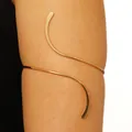Minimalist gold S-shaped chain arm cuff with a sleek polished finish and adjustable open band - S-Shaped Streamline Style (5344)