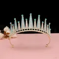 Dettaglio corona da sposa con cristalli blu e base dorata per abito da matrimonio - Oro KC [Blu Lago]