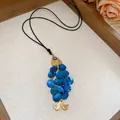 Ethnic fish pendant necklace with blue scales, gold details and evil eye bead - Dark Blue Shell Scale Fish Shaped Pendant Necklace