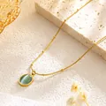 Collier chaîne à billes en acier titane doré avec pendentif ovale en œil de chat bleu - Pierre d'Oeil de Chat Vert Clair Doré