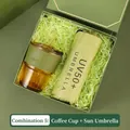 Business gift set featuring an amber glass coffee cup and a forest green sun umbrella - Bamboo Glass Cup Sun Umbrella (FA-06)