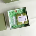 Green gift set with embossed glass cup, small square towel, and golden flower spoon - Embossed Glass Cup Towel Gold Spoon (F-34)