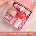 Pink business gift set including a coffee mug, folding umbrella, and hand-held mini fan - Pink Cup Sun Umbrella Mini Fan (TA-31)