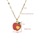 Collana dorata con ciondolo a mela rossa e dettaglio a cuore giallo su catena sottile - Mela (XL366)