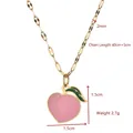 Gold-tone necklace with a pink peach pendant and green leaf detail for women - Peach Style (BXGXL367 Peach)