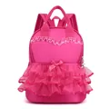 Bright pink girl's dance backpack with tiered mesh ruffles and a satin bow detail - Rose Red
