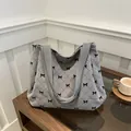 Borsa tote grande in velluto a coste grigio con stampa a fiocchi neri per scuola - Grigio