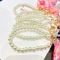 Elegant white pearl bead chain keychain with pink cherry blossom liquid shaker pendant charm - Pearl-Style Link Chain