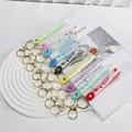 Set of colorful silicone keychains with Sweet text and cute fruit charms for bags. - Drip Glue Silicone Strap