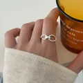 Vintage S925 sterling silver link ring with a unique twisted band design for women - Double Ring Chain Twisted Open Style (JZ1401)