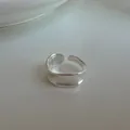 Minimalist S925 sterling silver wavy open ring featuring a high-polished metallic finish - Liquid Flow Wave Edge Open Style (JZ1393)