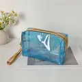 Blaue Glitzer-PVC-Kosmetiktasche mit goldenem Reißverschluss und Handschlaufe - Seeblau