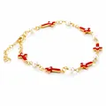 Golden bracelet with red enamel cross, white pearls, and evil eye detail on white background - Mother Mary Red