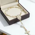 Golden religious bracelet with white pearls, Virgin Mary medal and zircon cross - Cross White