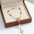 Religious bracelet with gold chain, red crosses, pearls and Virgin Mary medal charm - Red Cross