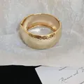 Close-up of retro hammered metal bangle in gold with vintage textured surface detail - Vintage Hammered Pattern Style / 8# Bangle-Gold
