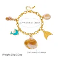 Vergoldetes Ozean-Charm-Armband mit Delfin- und Muschelanhängern und Größenangaben - B2163