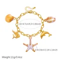 Detailed view of gold stainless steel charm bracelet with ocean pendants and dimensions - B2167