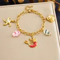 Gold plated stainless steel ocean theme charm bracelet with lobster and starfish charms - Lobster Starfish Ocean Style (B2161)