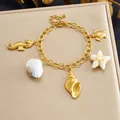 Gold-plated stainless steel ocean series charm bracelet with beach theme pendants - Turtle Starfish Ocean Style (B2164)