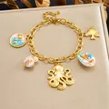 Ocean charm bracelet with gold-plated octopus and sea shell pendants, beach style - Octopus Crab Ocean Style (B2169)