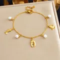 Gold-plated stainless steel ocean charm bracelet with pearls and sea life charms (81) - Octopus Claw Ocean Style (B2171)