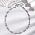 Elegant silver metal waist chain belt with sparkling crystal accents for women. - Round Carved Rhinestone Style (4556) / Silver