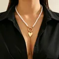 Elegante collana di perle con ciondolo a cuore dorato e catena a nappa per donna - Stile Pendente a Cuore con Perla Artificiale (A-472)