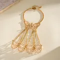 Detail view of gold butterfly slave bracelet with hollowed finger rings and chains - Hollow Butterfly Style / Gold